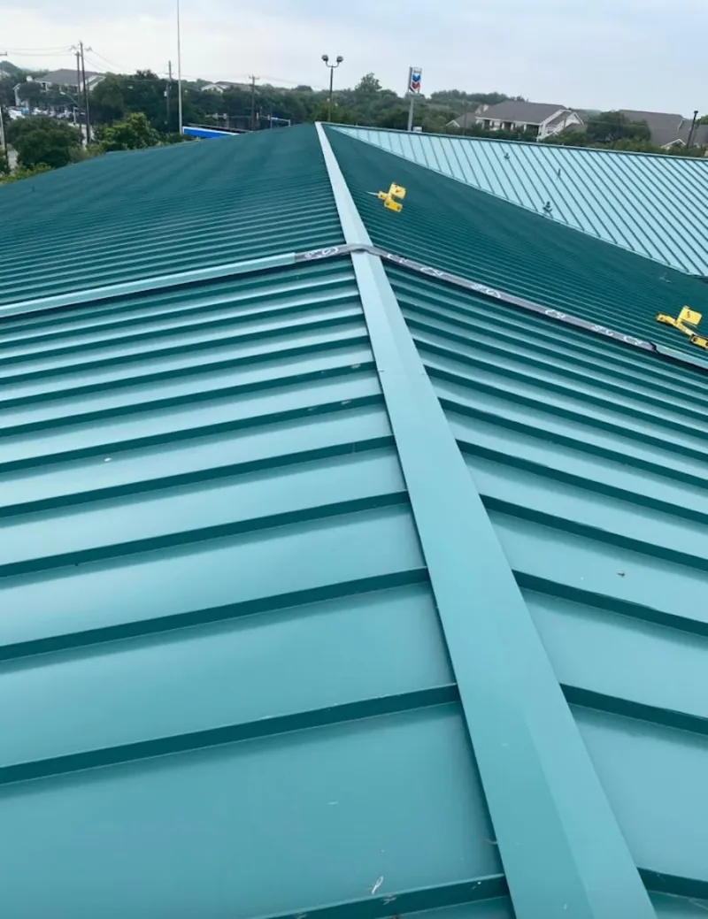 Green commercial metal roof ridge and valley for Metal Roof Repair in Las Cruces